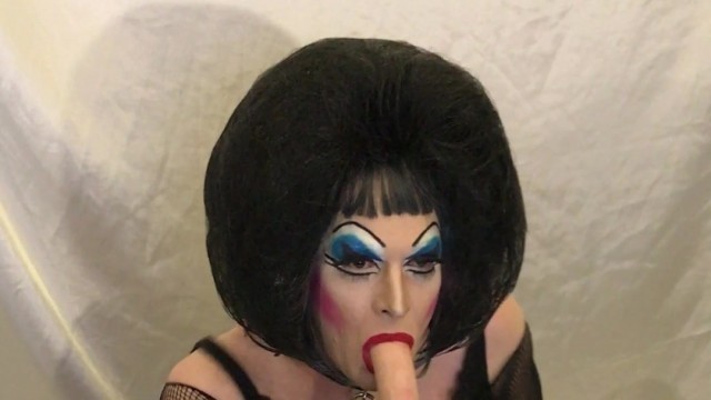 Drag Queen Slut inserts anal beads then cleans them off