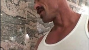 Muscled dad with thick mustache fucks raunchy boy