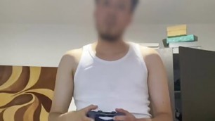 Young man loves to play video games naked and leave his big uncut cock dangling